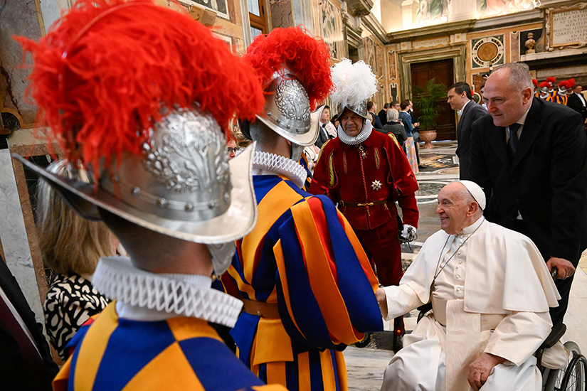 Pope Francis greeted members and new recruits of the Pontifical Swiss Guard at the Vatican May 6.